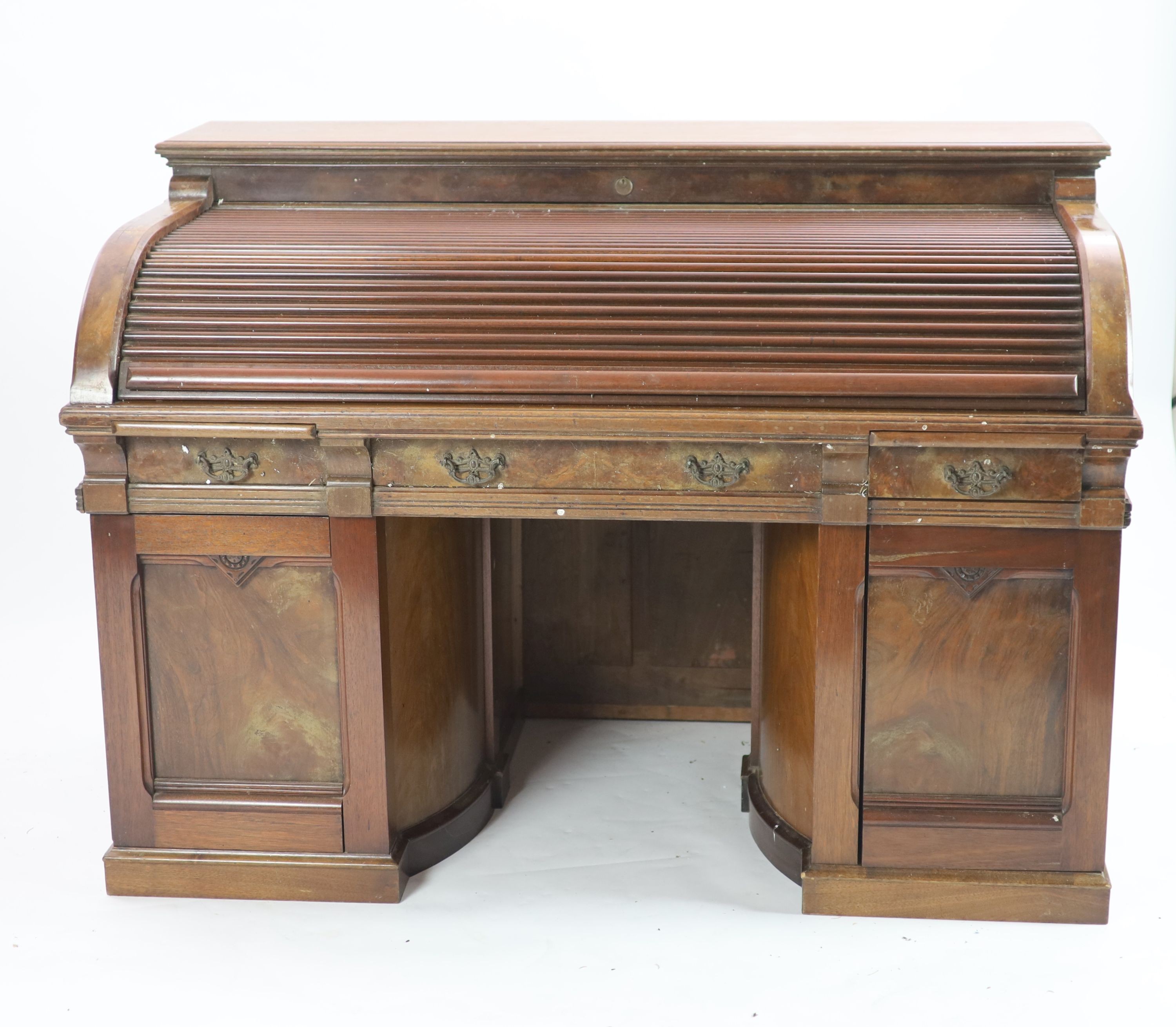 A late 19th century American walnut and mahogany 'Wootton' desk, W 150cm D 88cm H 109cm